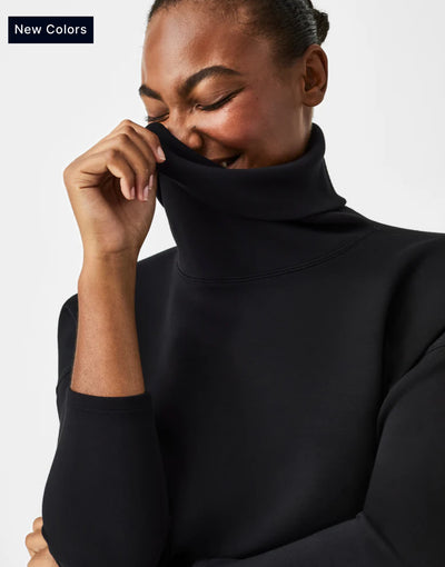 Air Essentials Turtleneck Tunic-Black